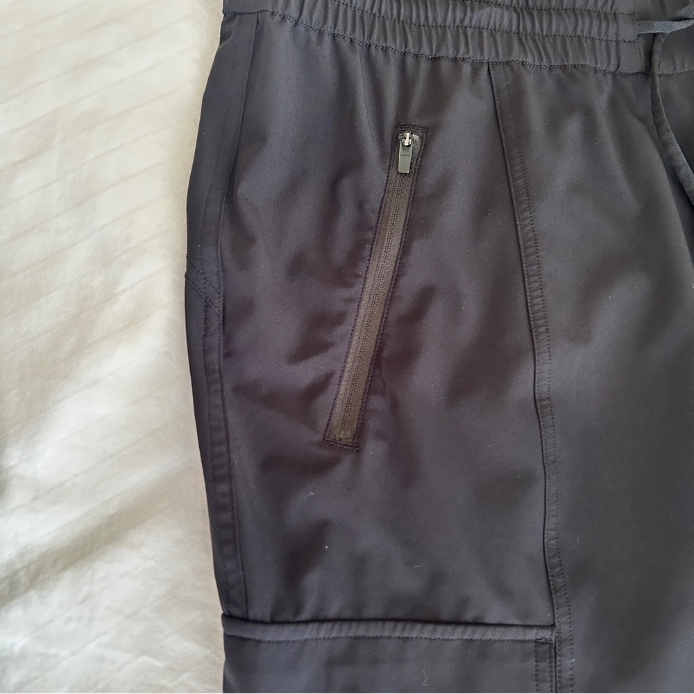 Athleta Unbound Black Jumpsuit Sleeveless Drawstring Waist Pockets size Large - Picture 11 of 15